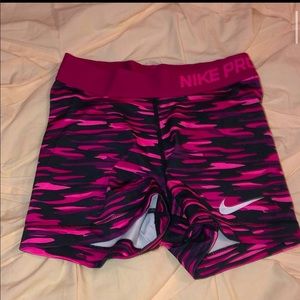 pink and black nike pros